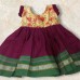 Magenta khan frock for baby girl with beige printed silk yoke