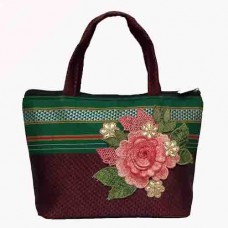 Maroon khun fabric purse with green border