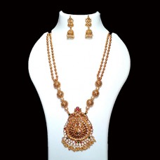 Golden necklace set with a touch of rani, green stones & off-white pearls