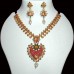 Golden stone necklace with red heart shaped pendant