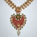 Golden stone necklace with red heart shaped pendant