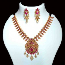 Matte gold necklace & jhumka set with a touch of matte rani stones