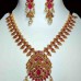 Matte gold necklace & jhumka set with a touch of matte rani stones