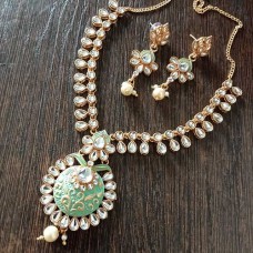 Kundan necklace & earrings set with a touch of mint