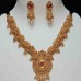 Golden necklace set with rani stone