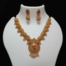 Golden necklace set with rani stone